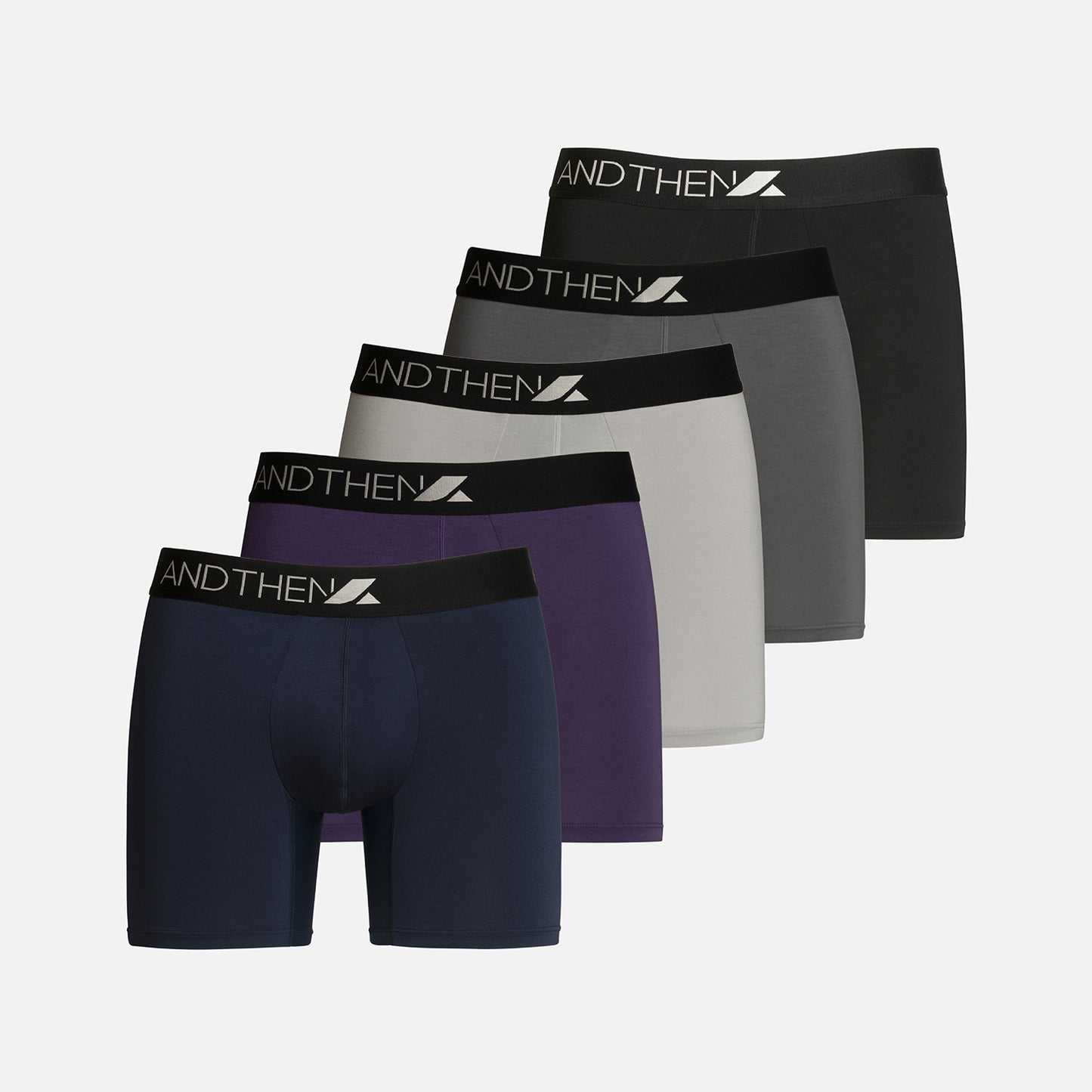 
                  
                    And Then men's bamboo boxer briefs - The Nine-to-fiver 5-pack, featuring five comfortable and eco-friendly pairs in various colours. Ideal for daily wear. This multipack of 5 contains one navy pair, one purple pair, one light grey pair, one dark grey pair and one black pair.
                  
                