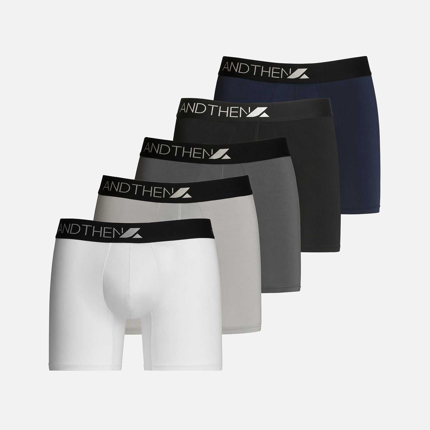 
                  
                    And Then men's bamboo boxer briefs - The Nine-to-fiver 5-pack, featuring five comfortable and eco-friendly pairs in various colours. Ideal for daily wear. This multipack of 5 contains one white pair, one light grey pair, one dark grey pair, one black pair and one navy pair.
                  
                